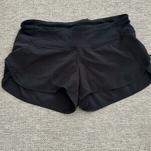 Lululemon low rise speed up shorts in size 4.